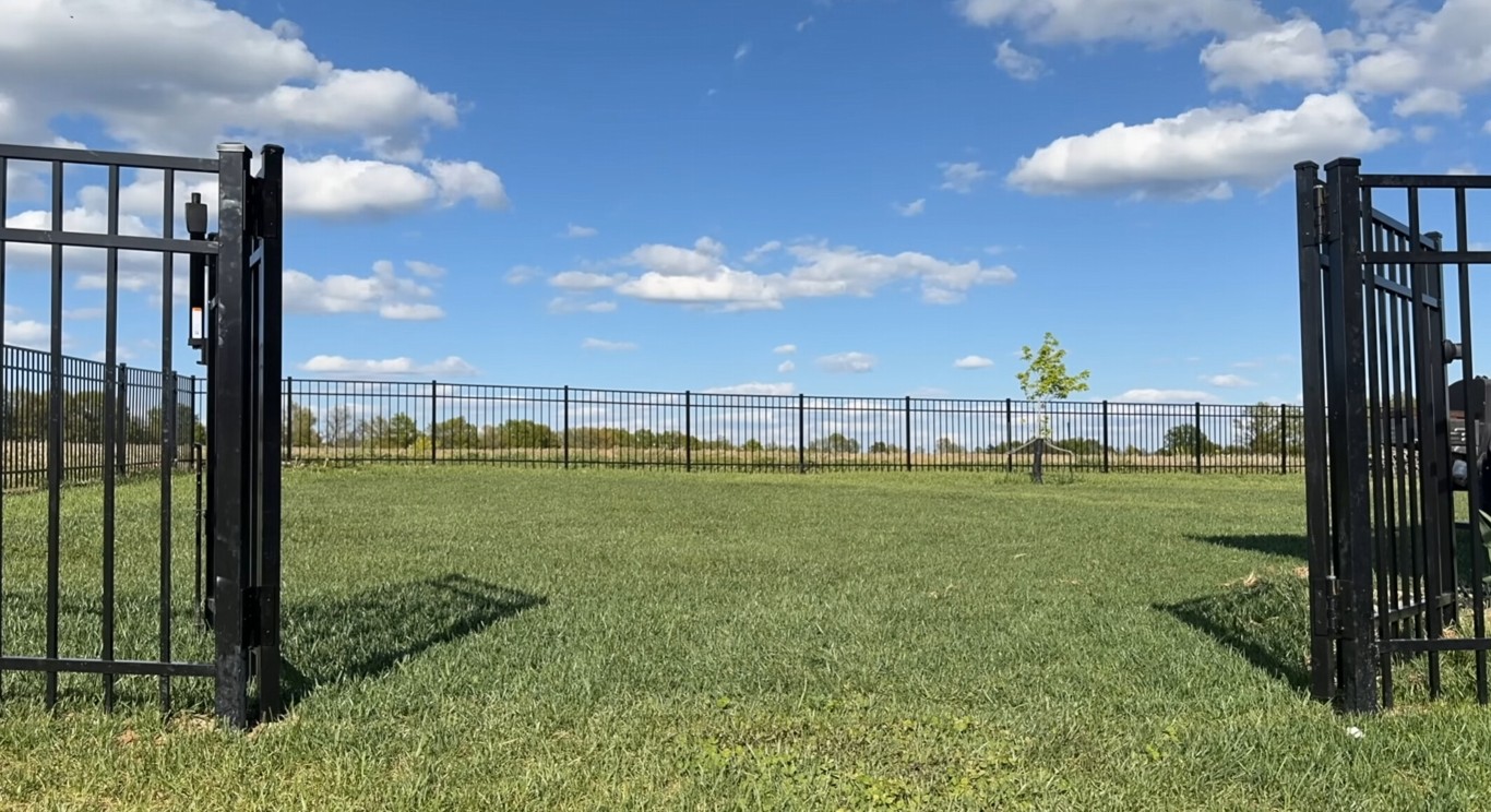Black aluminum ornamental gate and fence in Pike Road, AL