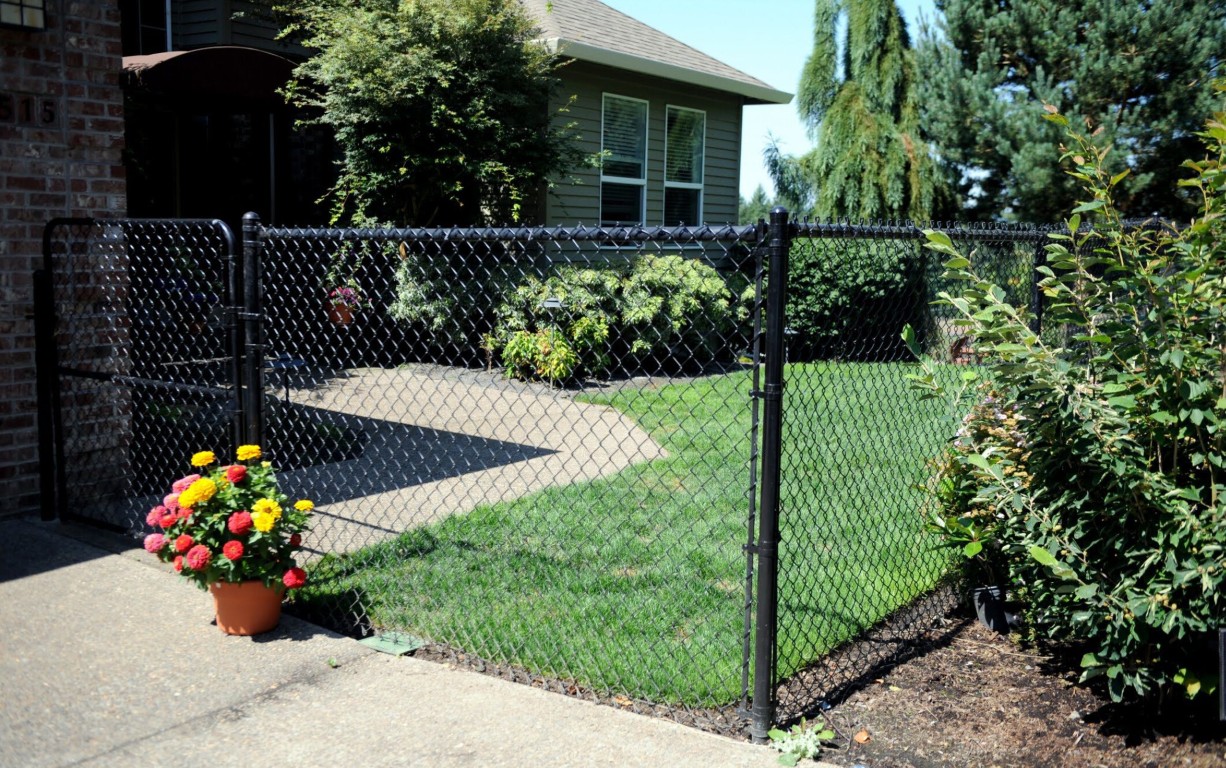 Chain-link fence with privacy slats installation in Pike Road, Alabama